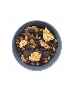 a bowl of Tony's Trail Mix on a white table